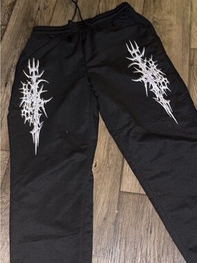 NFINITY Black Sweatpants with White Tribal Graphic